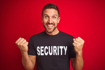 Young safeguard man wearing security uniform over red isolated background celebrating surprised and...