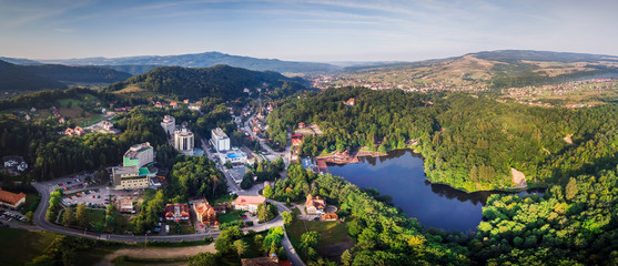 Aerial panoramic drone shot of Sovata city with Ursu Lake