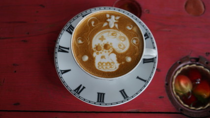 cup of coffee on wooden table