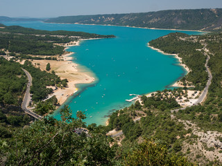 Fototapeta na wymiar France, July 2019: View to the lake of Sainte-Croix, Verdon Gorge, Provence, near Moustiers-Sainte-Marie, department Alpes-de-Haute-Provence, region Provence-Alpes-Cote d'Azur