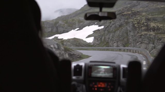 Lockdown: Small Winding Road with Snow Covering Parts of the Area - Geiranger Fjord, Norway
