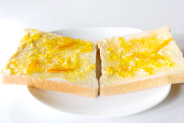 Bread and orange homemade jam