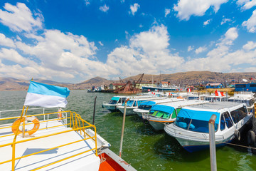 Fototapeta na wymiar Peru Lake Titicaca tourist boats at the port of Puno