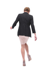 Fototapeta premium rear view . young business woman goes forward.