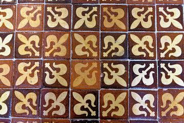 Medieval painted stone floor tiles inside Winchester Cathedral, Hampshire, England