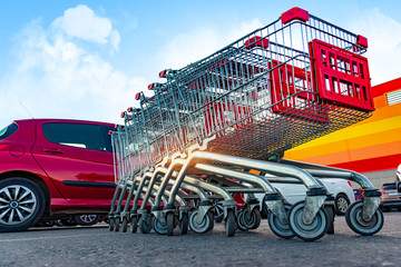 consumer grocery shopping cart trolley supermarket parking lot