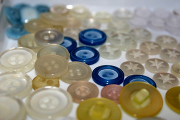 assorted old used buttons