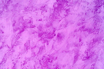 Fototapeta na wymiar The texture of the textured wall is purple. Stylized textural banner with space for text.