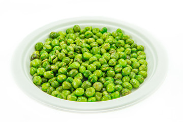 Sugar pea grains in natural pulp dish isolated on white background