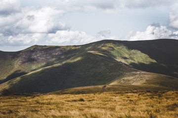 Fototapeta premium Beautiful summer landscape of Borzhava ridge rolling in the distance.