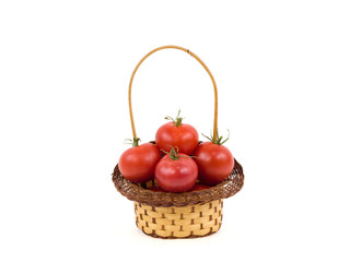 Tomatoes in a basket on a white background