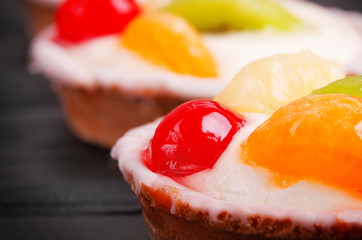 delicious tarts with fruit and cream