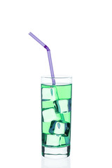 A glass cup of blue cocktail c tube ice cubes on a white background.