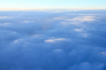 Fototapeta na wymiar 上空　雲の上より空撮