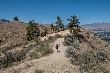 Girl hiking top of Saddle rock Wenatchee 