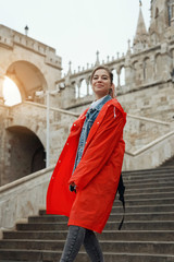 Fototapeta na wymiar Young woman with blonde hair in the Fisherman's Bastion in the Castle district of Budapest