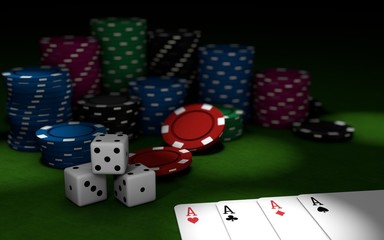 playing cards,dices and poker chips on green poker table
