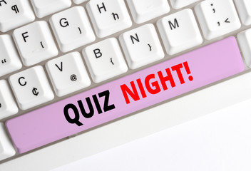 Handwriting text writing Quiz Night. Conceptual photo evening test knowledge competition between individuals White pc keyboard with empty note paper above white background key copy space