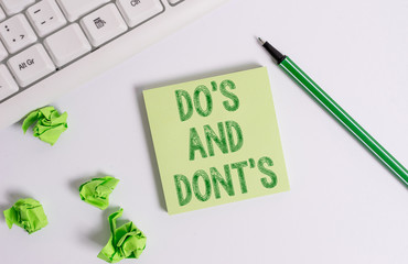 Conceptual hand writing showing Do S Is And Dont S Is. Concept meaning advising Rules or customs...