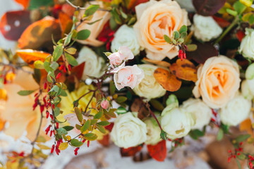 Autumn flowers decor, cream beige roses with fall berries