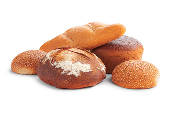 Beautiful composition of several varieties of delicious freshly baked bread with a crispy golden crust isolated on a white background
