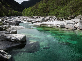 Naklejka na ściany i meble Beautiful landscape - The clear water of the Verzasca River, Switzerland