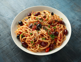Pasta Alla Puttanesca with garlic, olives, capers, tomato and anchois fish