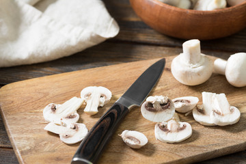 Chopped mushrooms on a wooden Board