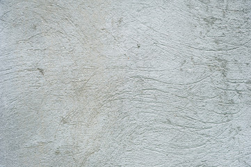 texture of gray rough stucco on the wall