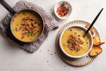 Lentil pea soup garnish with bacon and pork ribs