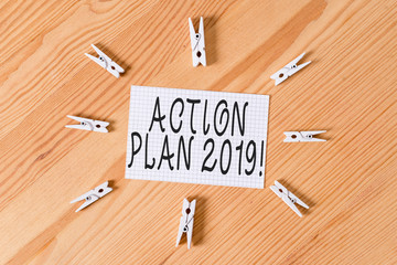 Conceptual hand writing showing Action Plan 2019. Concept meaning proposed strategy or course of...