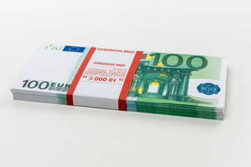Euro cash in bundles of one hundred and two hundred banknotes, Euro money Euro on a white background, isolated on a white background