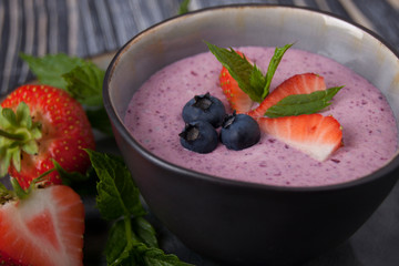 Smoothie with raspberries and blueberries