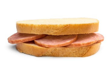 Sandwich with sausage on white. Close up.