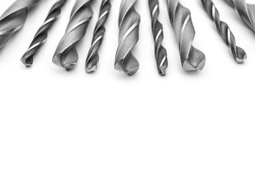 Drill bits on a white background. Space for text. © igorkol_ter