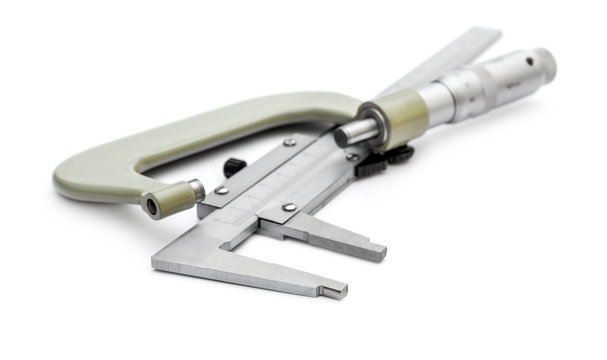 Micrometer with vernier calliper on white.