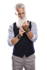 Handsome aged male model posing  on white background