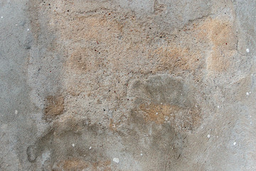 Old cracked weathered shabby plastered peeled wall texture background