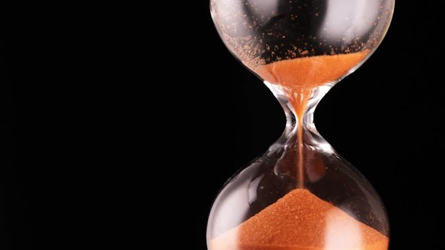 hourglass on a black background