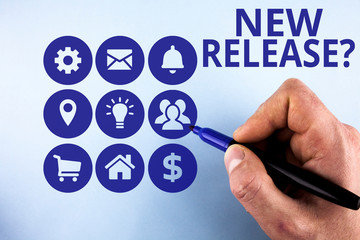 Conceptual hand writing showing New Release Question. Concept meaning asking about recent product or service newly unleashed Male designing layout presentation concept for business promotion