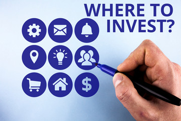Conceptual hand writing showing Where To Invest Question. Concept meaning asking about where put money into financial schemes or shares Male designing layout presentation concept for business