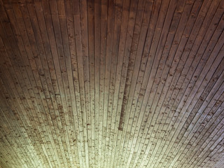 The ceiling is decorated with wooden battens in the house