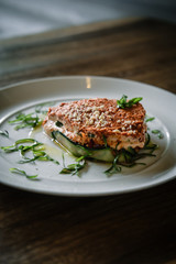 Raw vegan lasagna on a white plate. Dairy free, gluten free food.