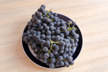 Ripe bunches of dark grapes