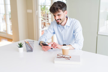 Young business man working using smartphone
