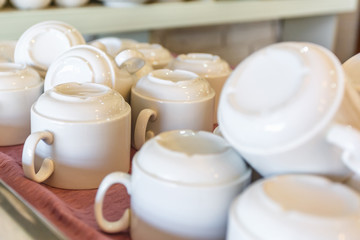 coffee cups on shelf  in the elite popular bar