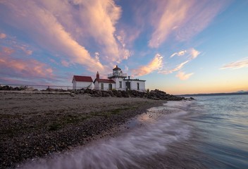 A lighthouse in Seattle at sunset 