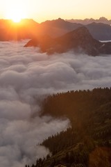 Mountain layers above fog at first light  - 287099625