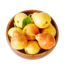 Naklejka na ściany i meble Pear in a bowl on white background. Organic pears top view.
