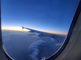 Fototapeta na wymiar view from car window of airplane